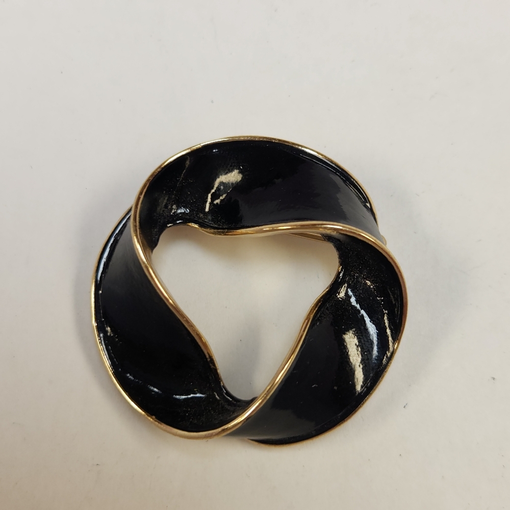 Kramer Gold Tone And Black Enamel Brooch